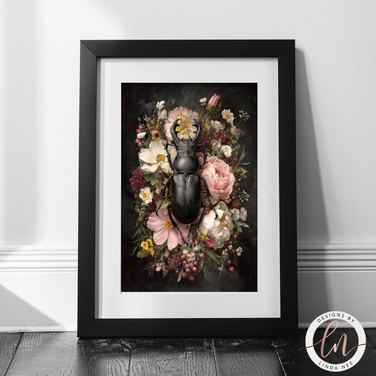 A framed print featuring a close-up of a large black beetle surrounded by a vibrant floral arrangement.