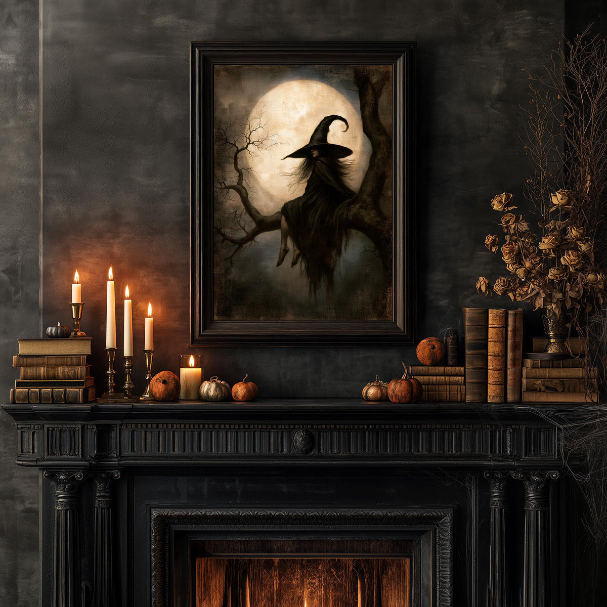 Moonlit tree artwork above a console with stacked books and a vase of flowers
