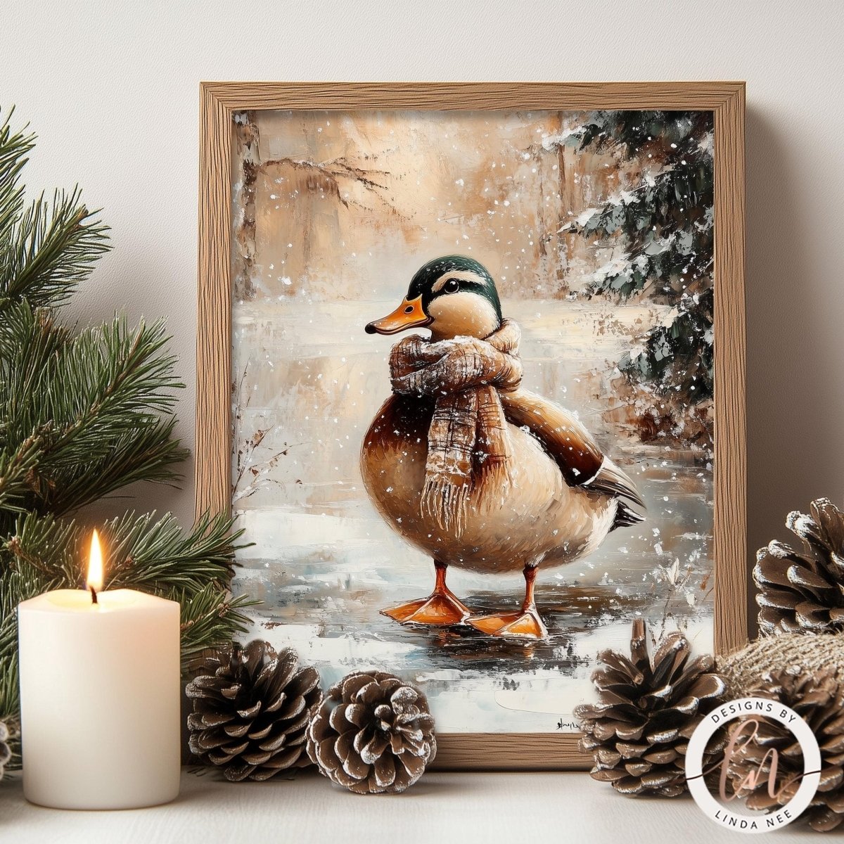 A framed painting of a duck wearing a scarf and standing on a snowy surface, surrounded by pine cones and a lit candle.
