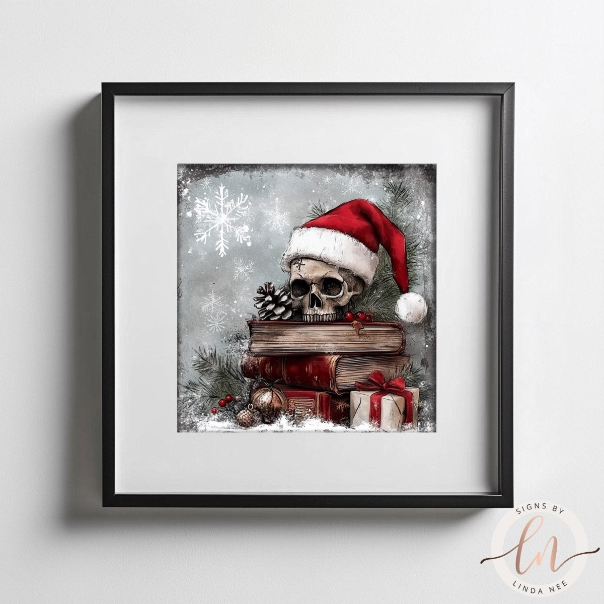 A framed illustration depicting a skull wearing a Santa hat, surrounded by books, pine cones, and Christmas decorations, set against a snowy background.