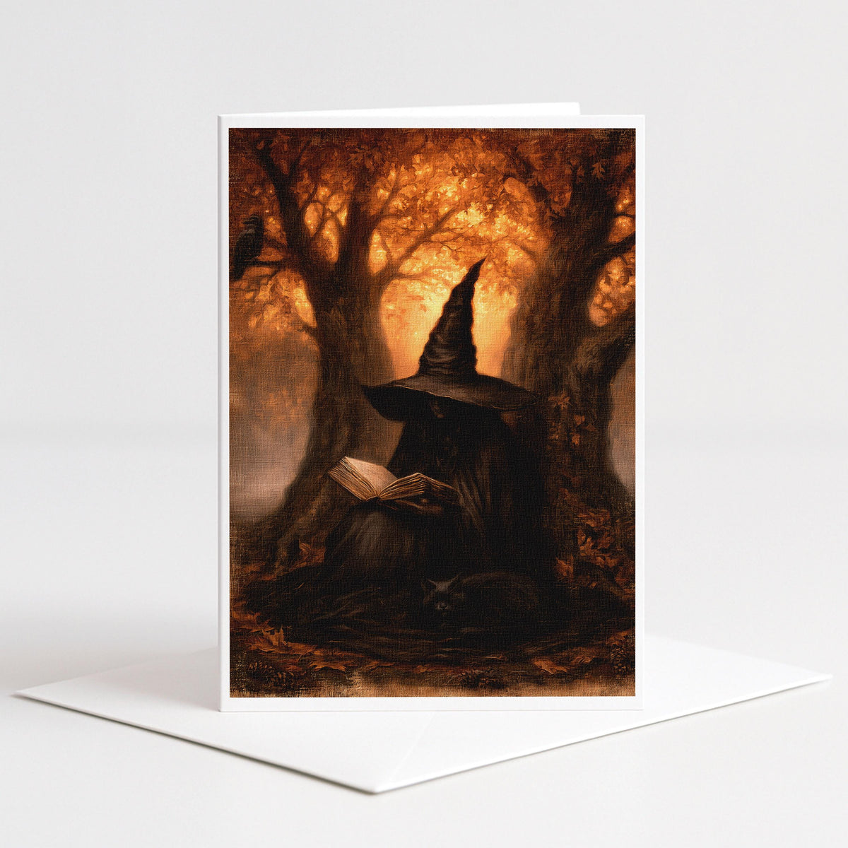 Witch reading a book beneath glowing autumn trees on a 5x7 blank note card by Designs by Linda Nee
