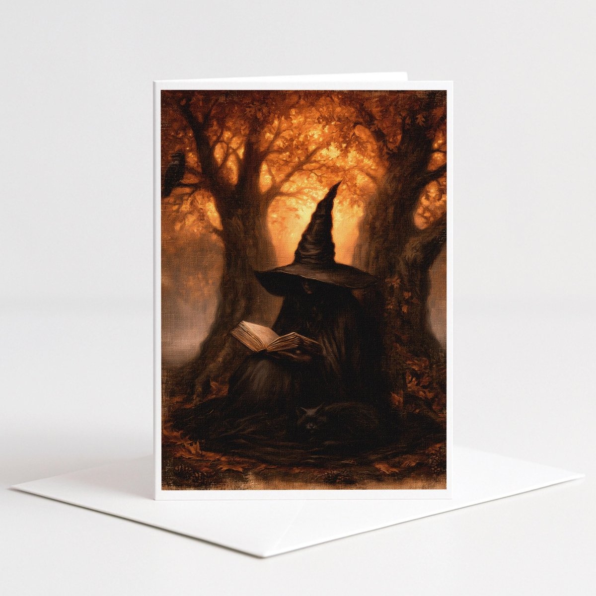 Witch reading a book beneath glowing autumn trees on a 5x7 blank note card by Designs by Linda Nee