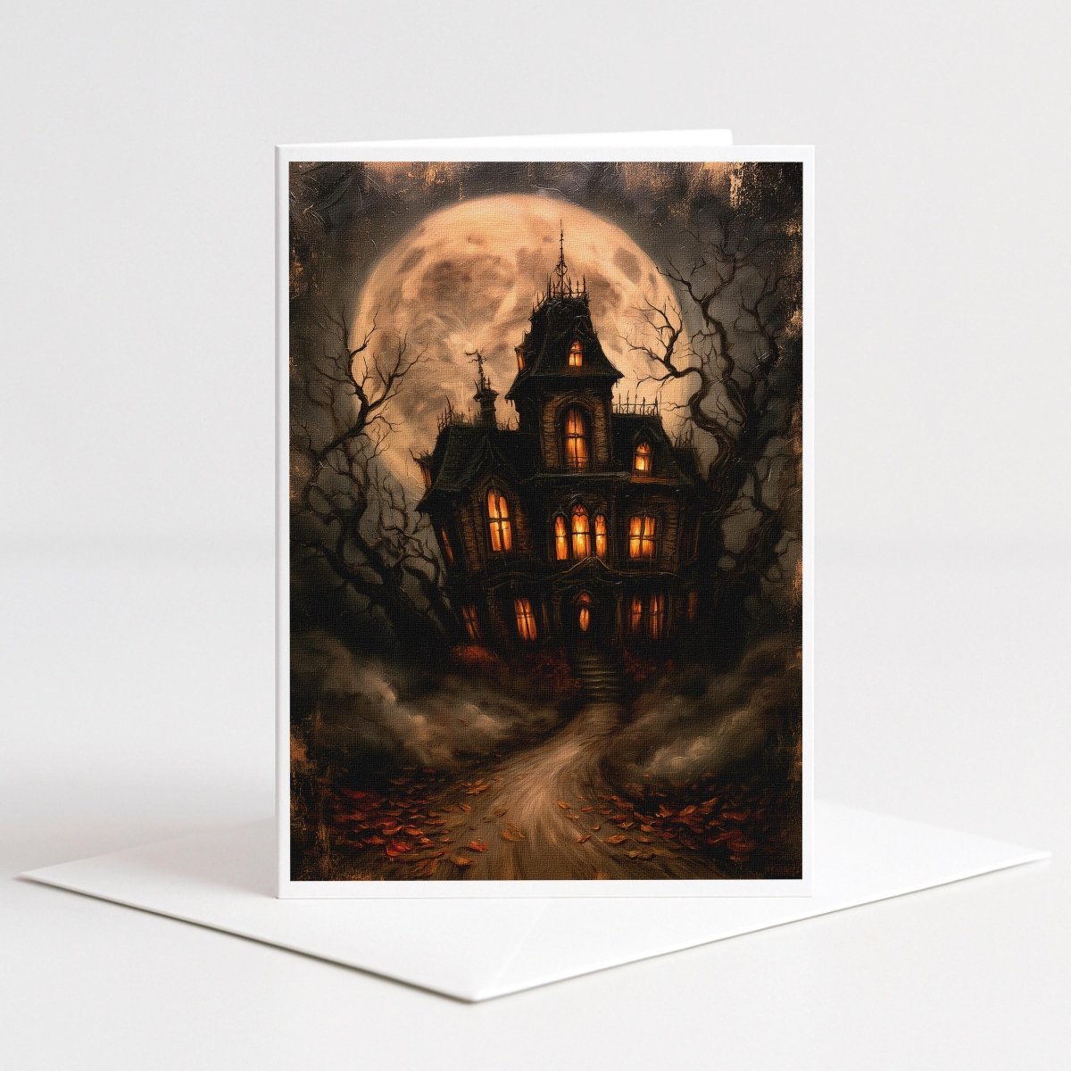 Victorian haunted house Halloween note card art of a crooked mansion with glowing windows under a full moon