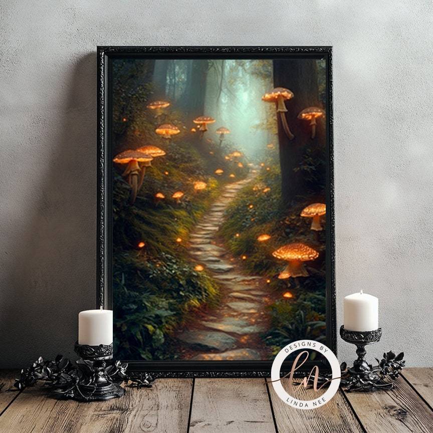 a framed painting of a forest path with glowing mushrooms, flanked by two candles on a wooden surface.