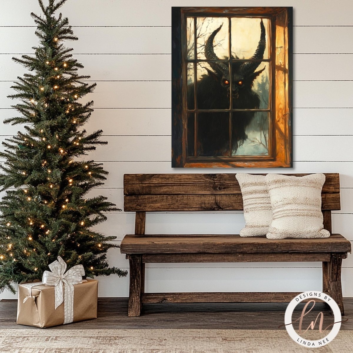 Krampus window artwork hung above a wooden bench beside a lit Christmas tree