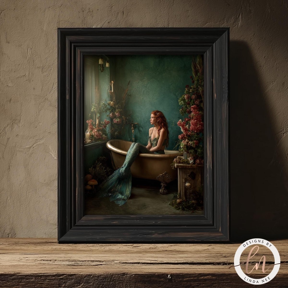 A mermaid sitting in a bathtub, surrounded by flowers and plants, in a painting framed on a wooden shelf.