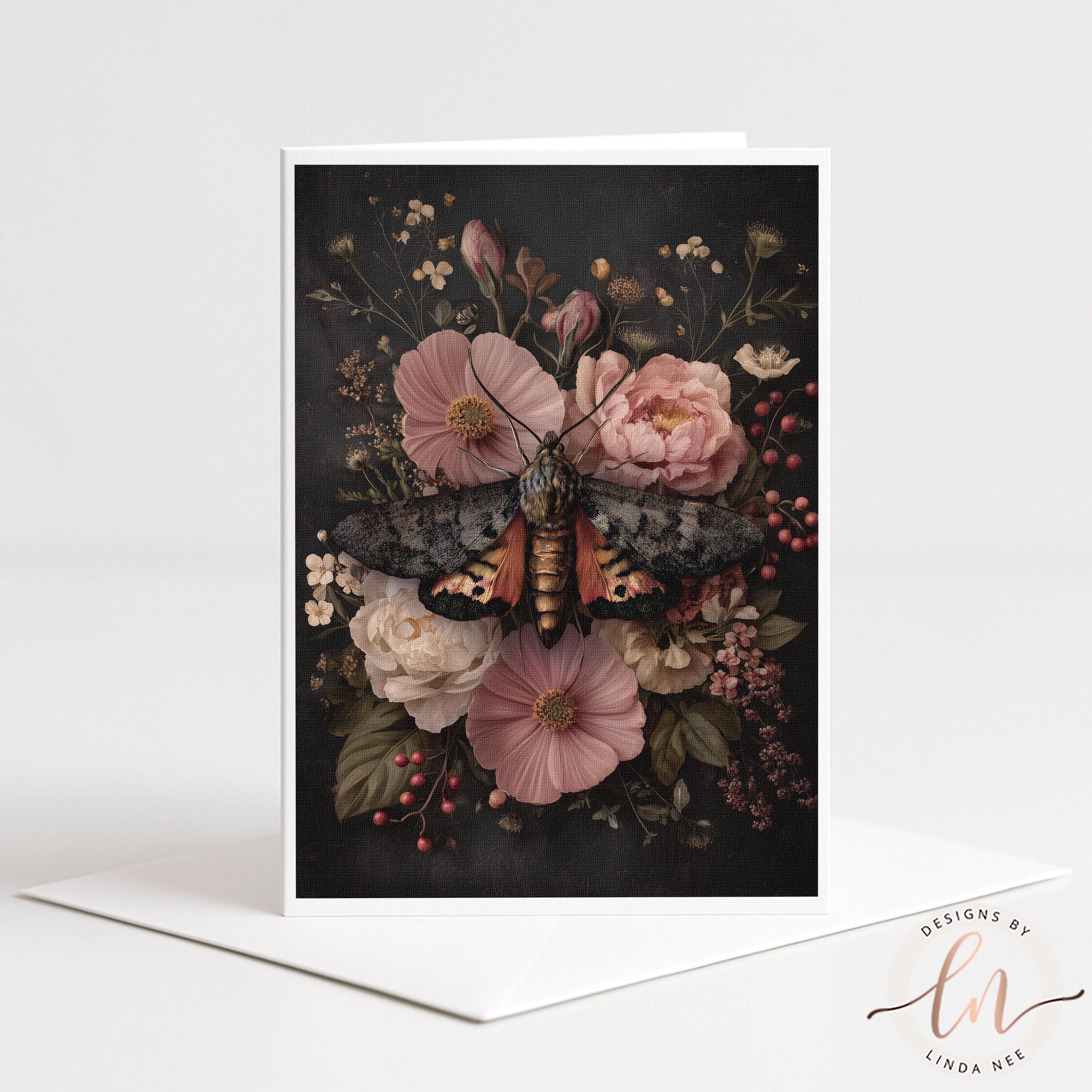 A card featuring a close-up of a butterfly resting on a floral arrangement, with various pink and white flowers surrounding it.