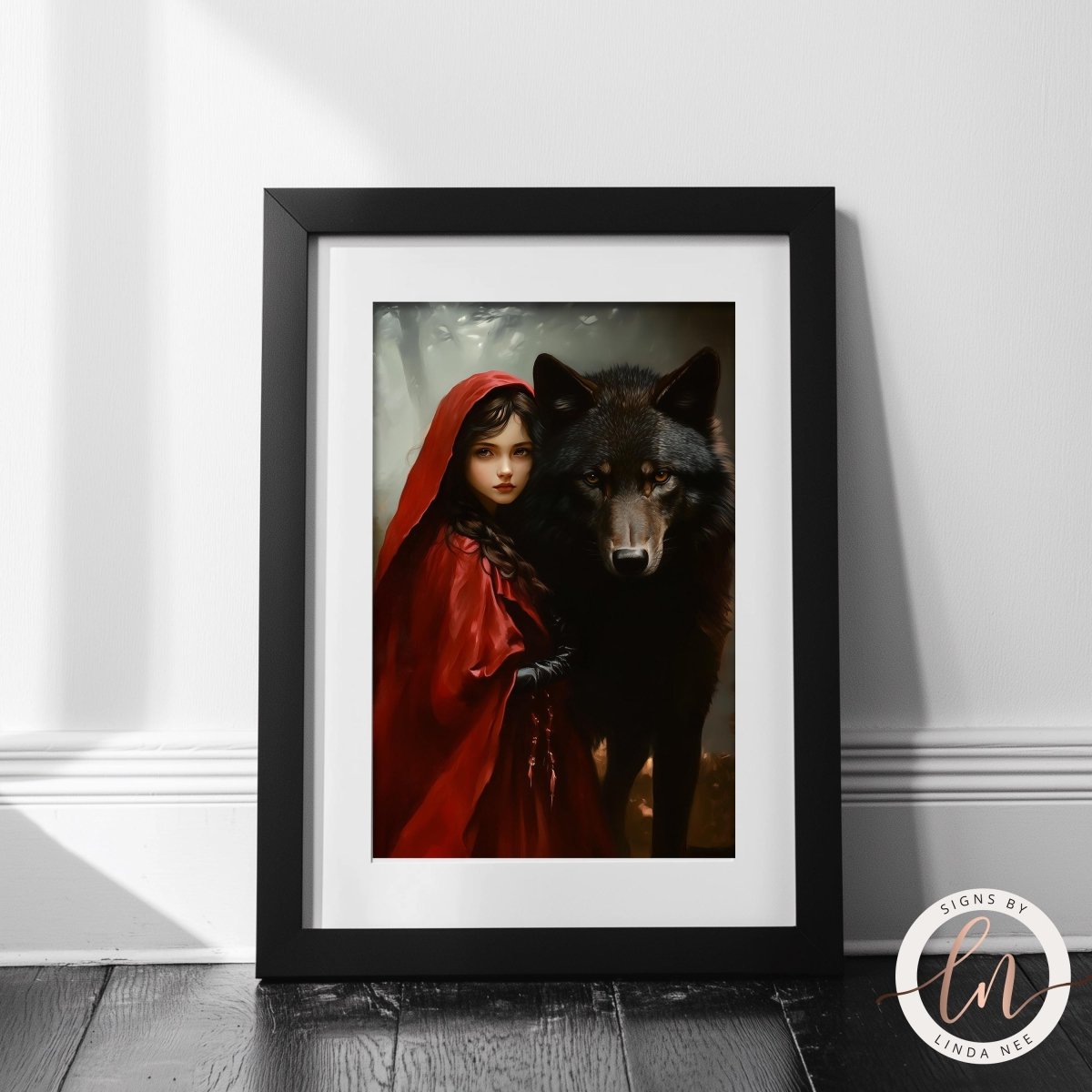 Misty forest wolf and red hood print shown on a dark wall
