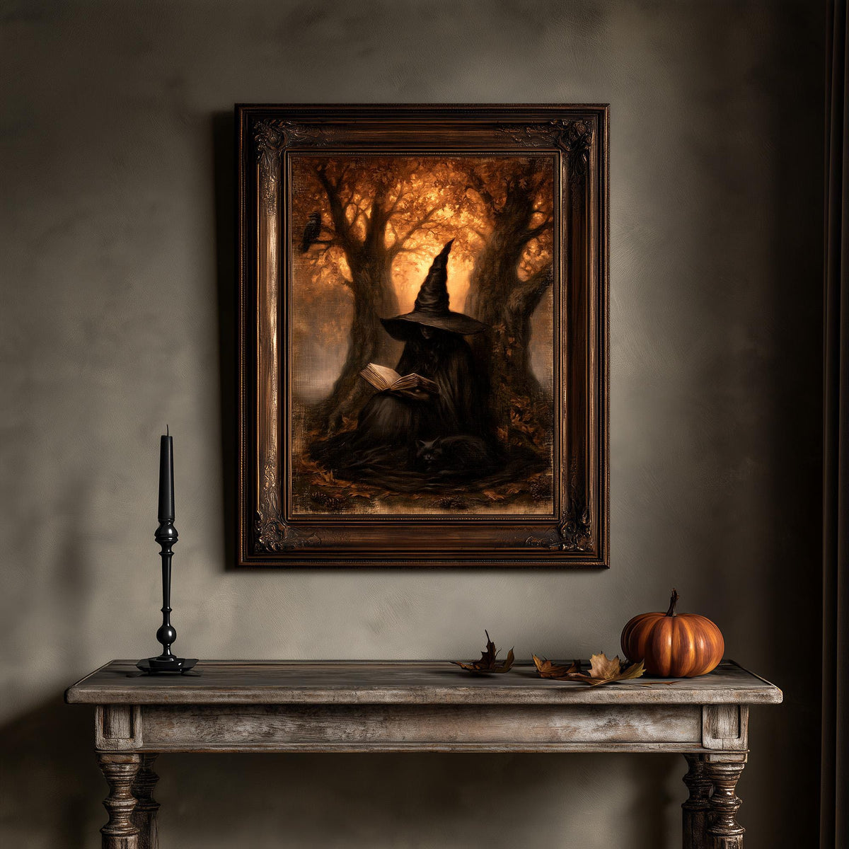 Witch reading print above a wooden table holding a pumpkin and a candle