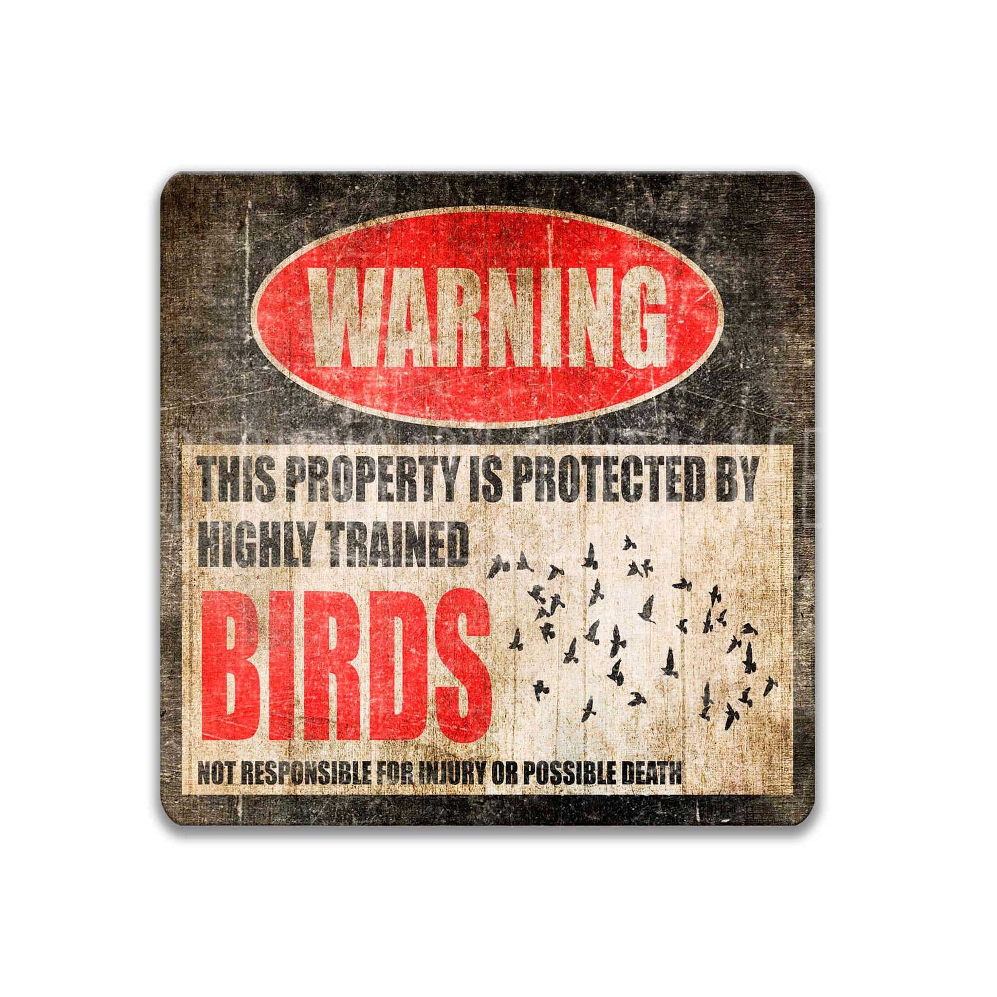 The image is a warning sign that states "This property is protected by highly trained birds" and warns that the property is not responsible for injury or possible death due to the presence of birds.