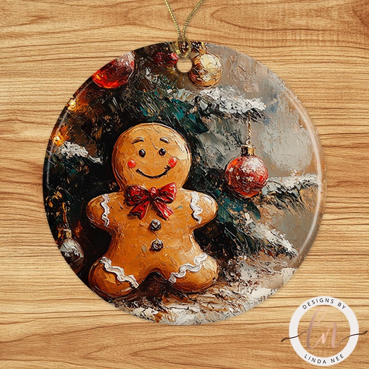 Ceramic ornament featuring a smiling gingerbread man in front of a decorated Christmas tree with warm lights and red baubles.