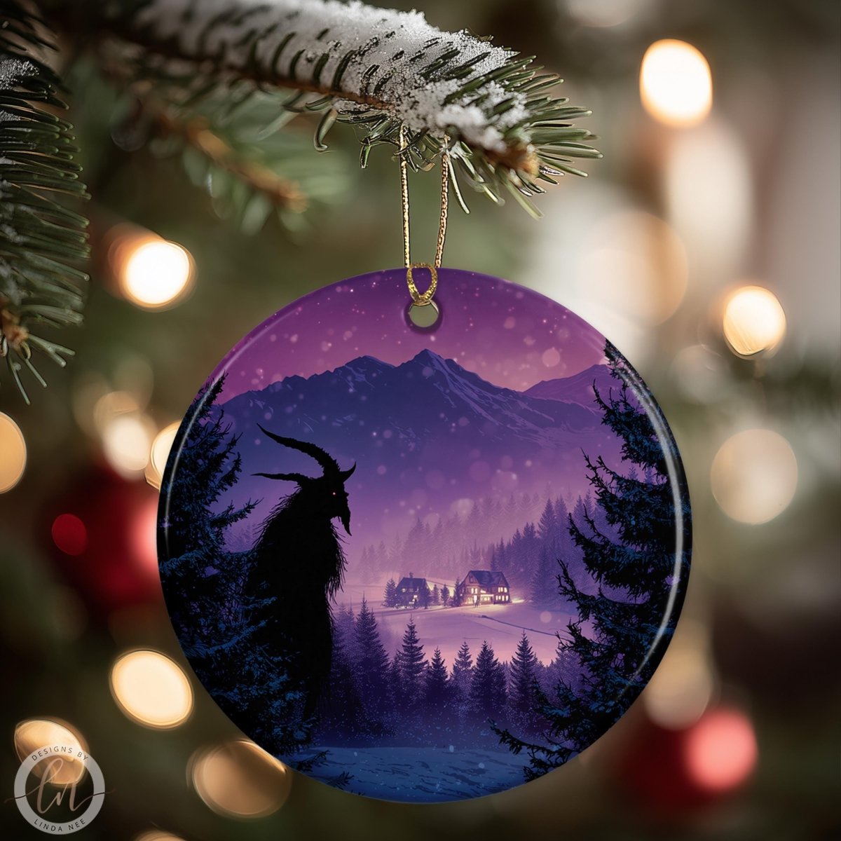 A purple ornament with a silhouette of a horned figure against a snowy mountain landscape, with a village in the distance.