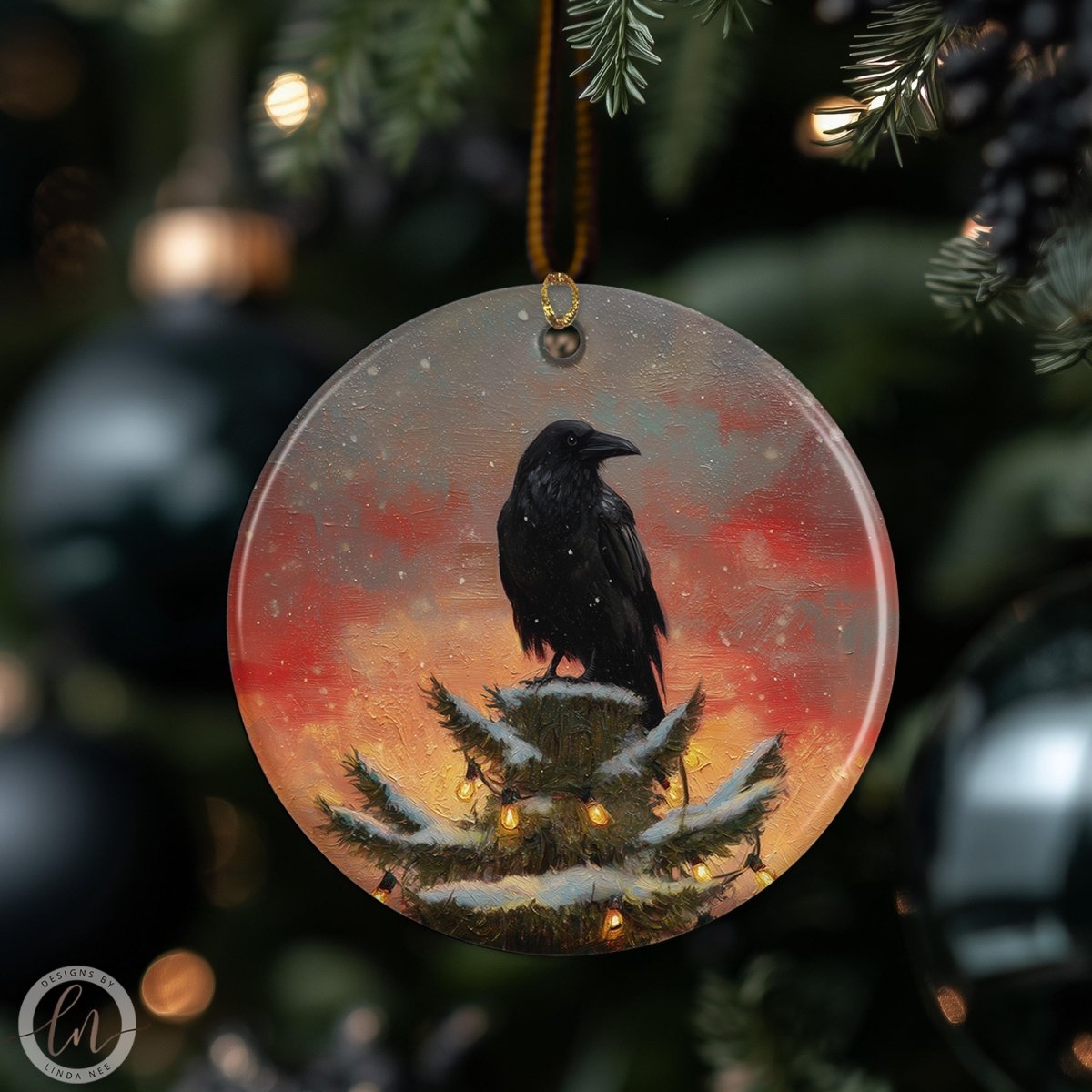 A black bird is perched on a snowy tree branch, with a red and orange sunset in the background.