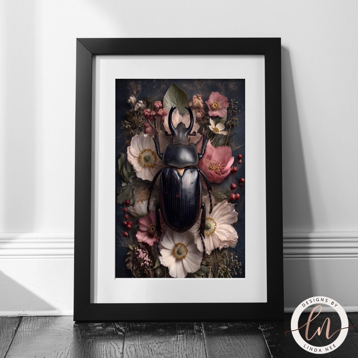 A framed print featuring a close-up of a dark-colored beetle surrounded by a vibrant floral arrangement.