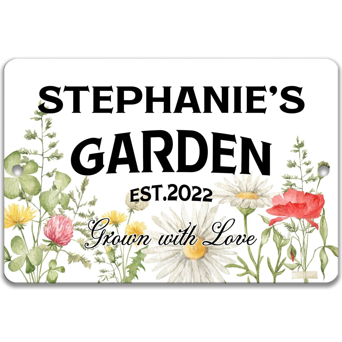 The image is a sign for Stephanie's Garden, featuring a floral design with various flowers and plants.