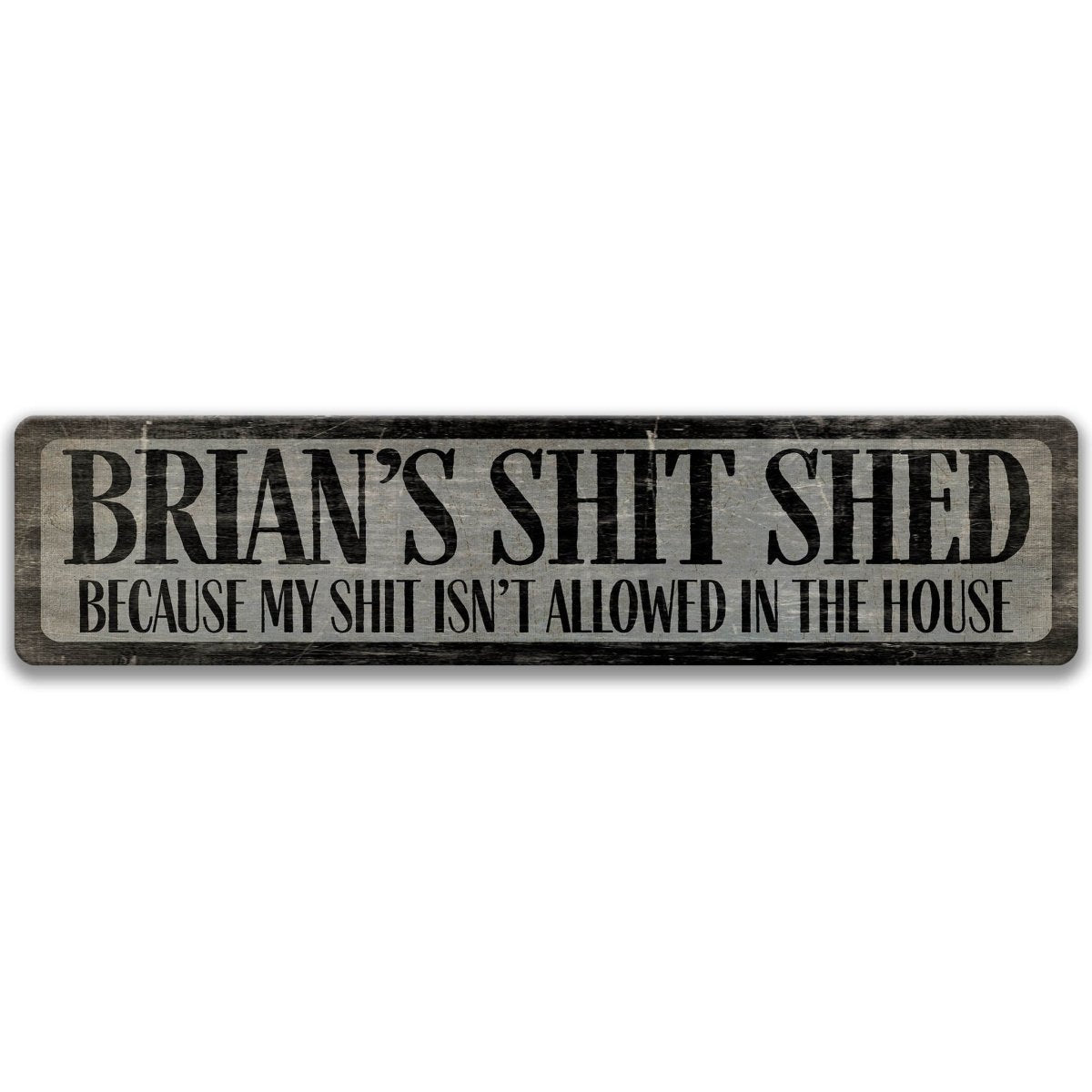 a sign with the text "BRIAN'S SHIT SHED" and below it, "BECAUSE MY SHIT ISN'T ALLOWED IN THE HOUSE".
