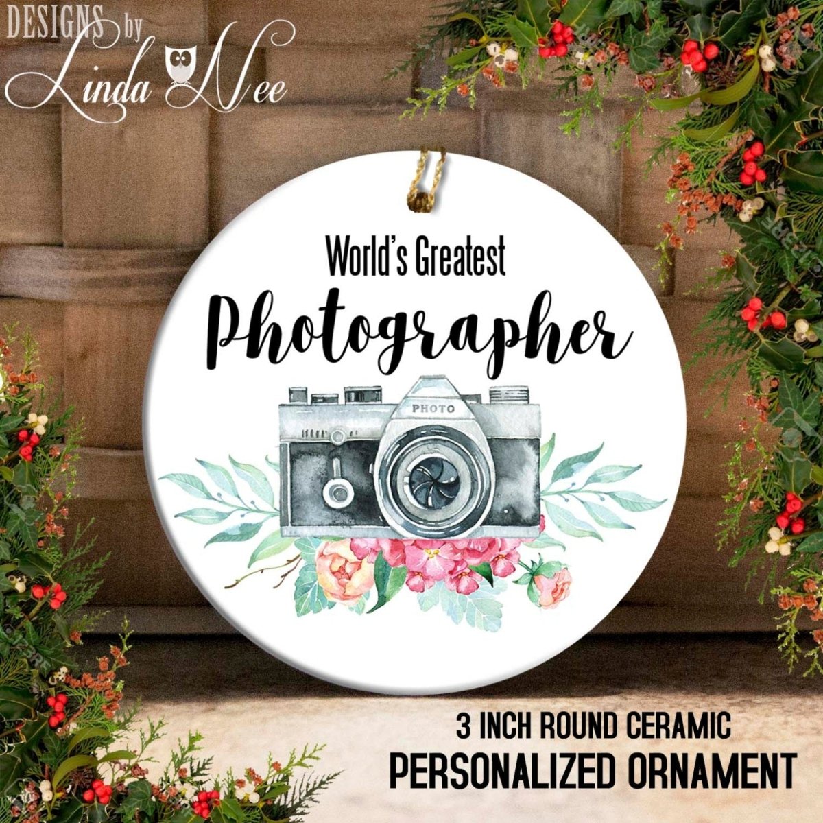 Round ceramic personalized ornament with camera design and text 'World's Greatest Photographer' on a decorative background.