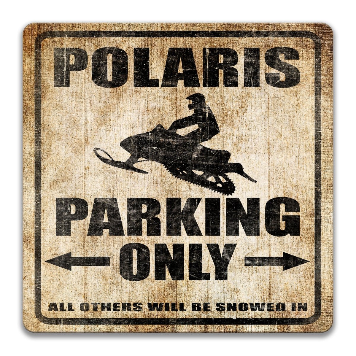 A weathered wooden sign with the text "POLARIS PARKING ONLY" and a silhouette of a snowmobile.