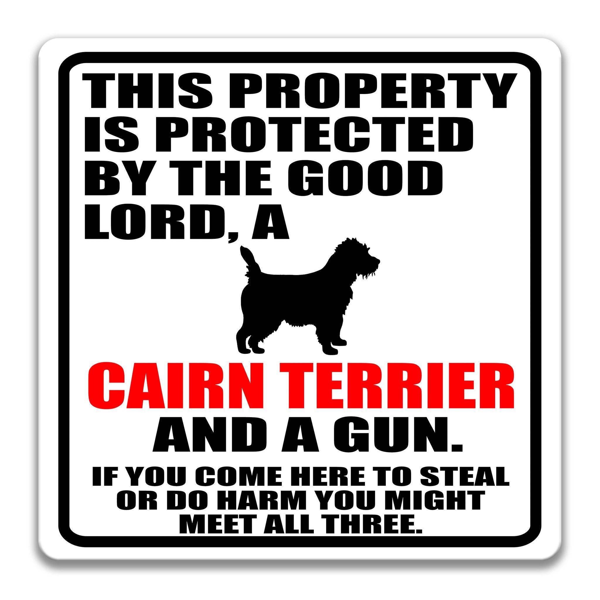 Property Protected by the Good Lord, a Cairn Terrier, and a Gun Dog Sign