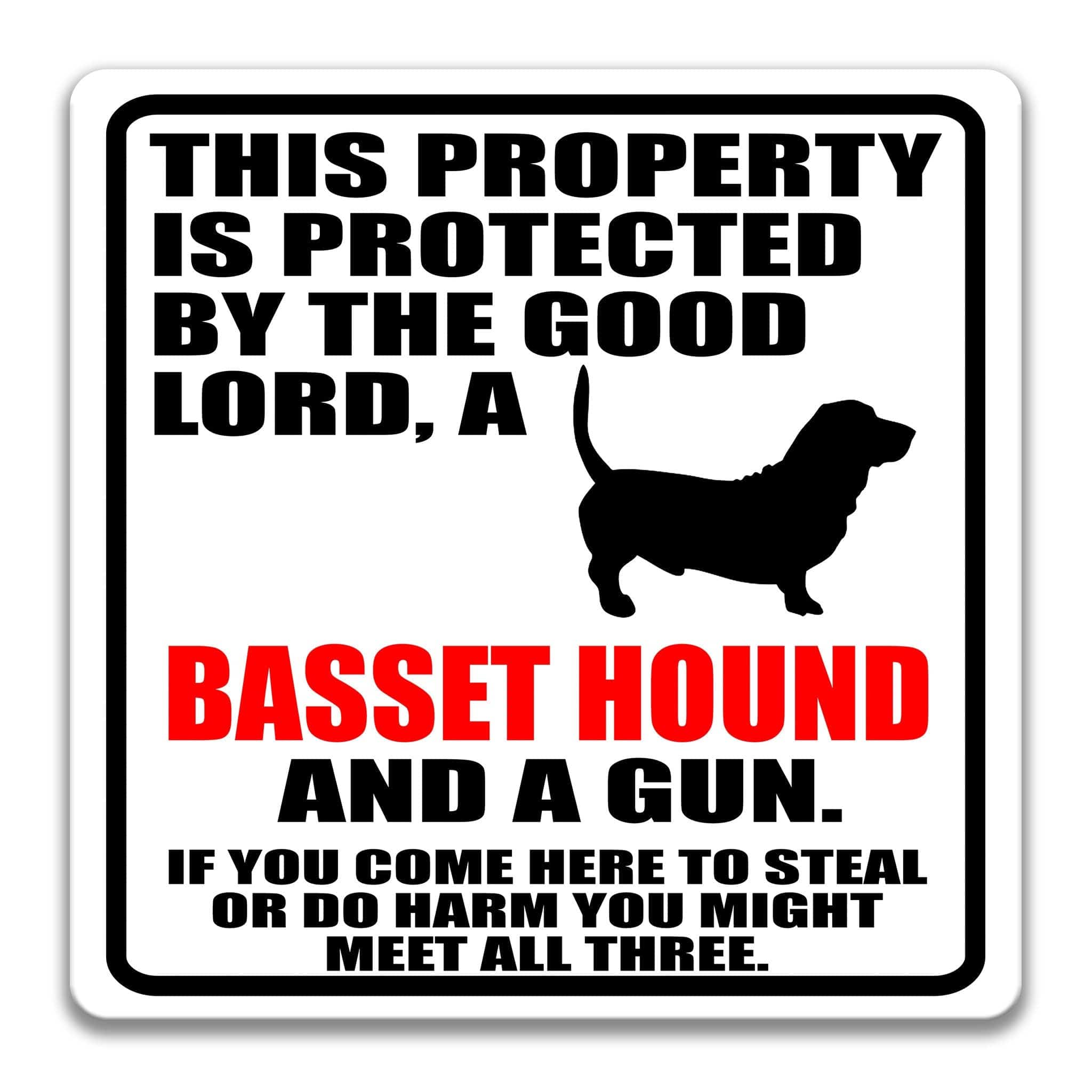 Property Protected by the Good Lord, an Basset Hound, and a Gun Dog Sign