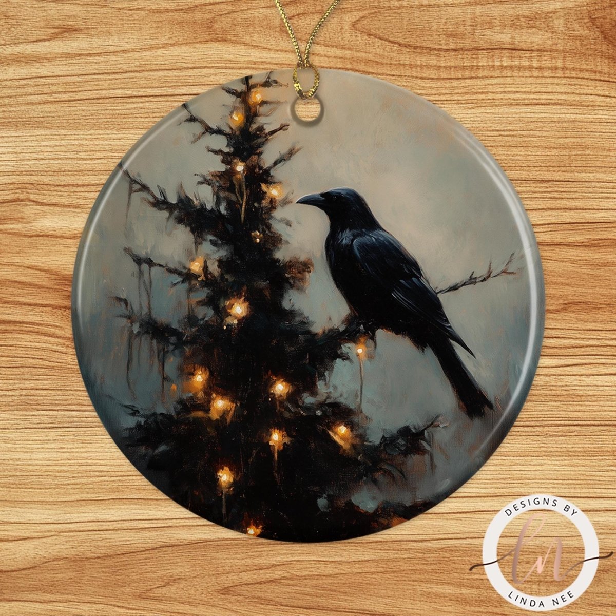 Round ceramic ornament featuring a black raven perched on a glowing Christmas tree, gothic holiday décor product image by Designs by Linda Nee