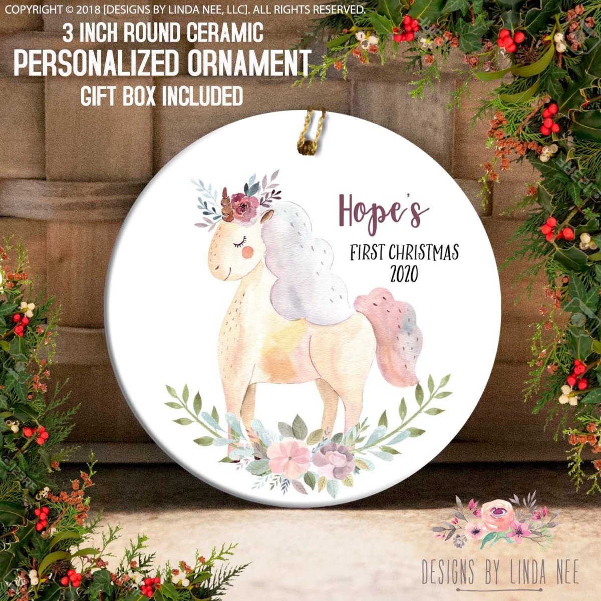 Round ceramic personalized ornament with unicorn design and text 'Hope's First Christmas 2020' on a decorative background.