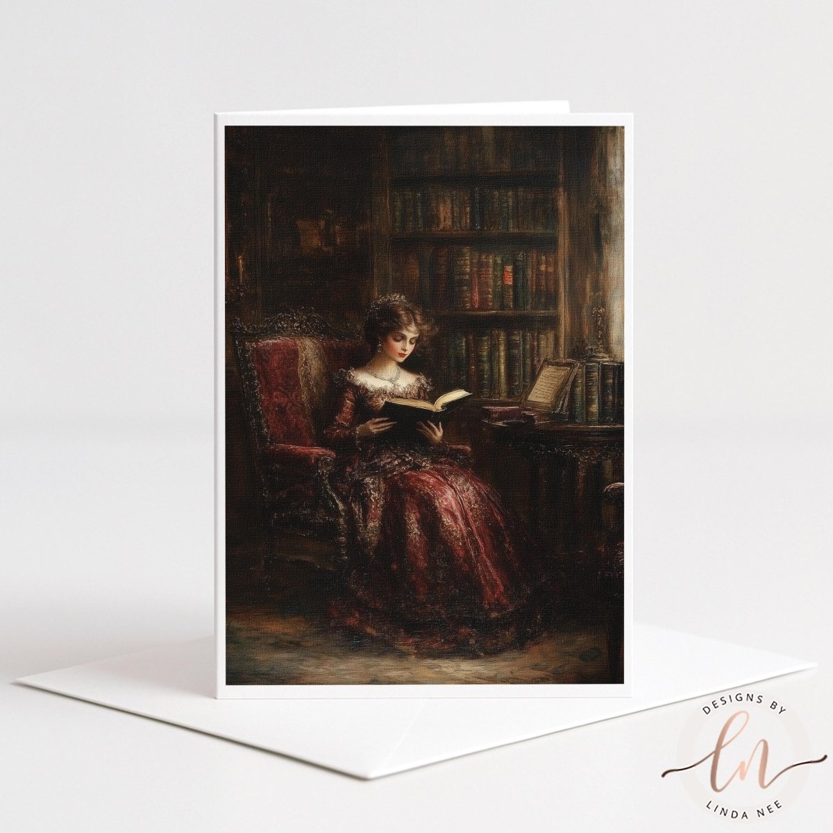 A woman in a red dress is sitting in a chair and reading a book in a dimly lit room with a bookshelf in the background.