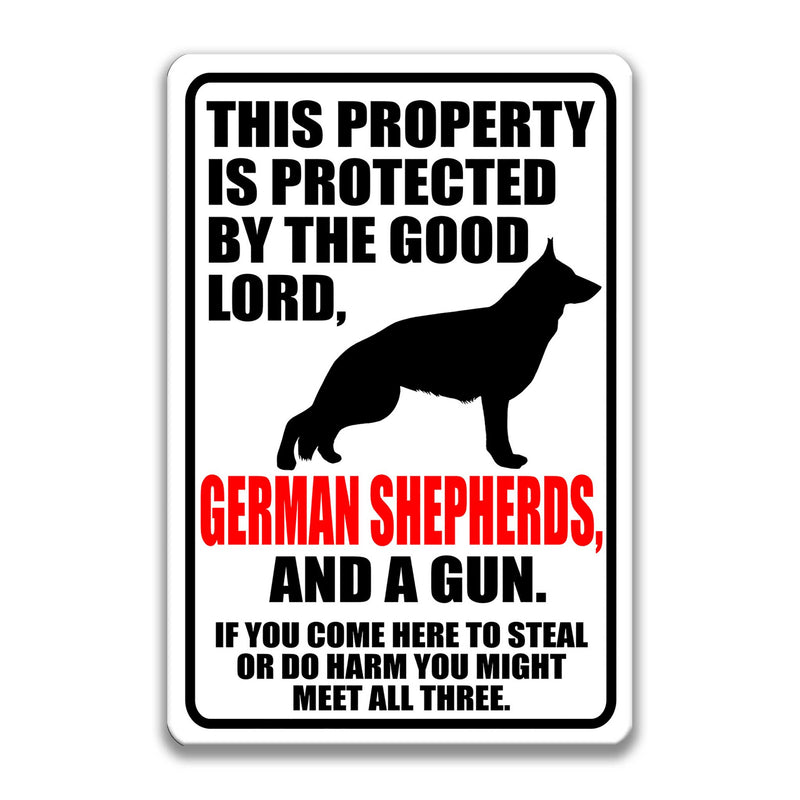 Lord, German Shepherds and a Gun Sign