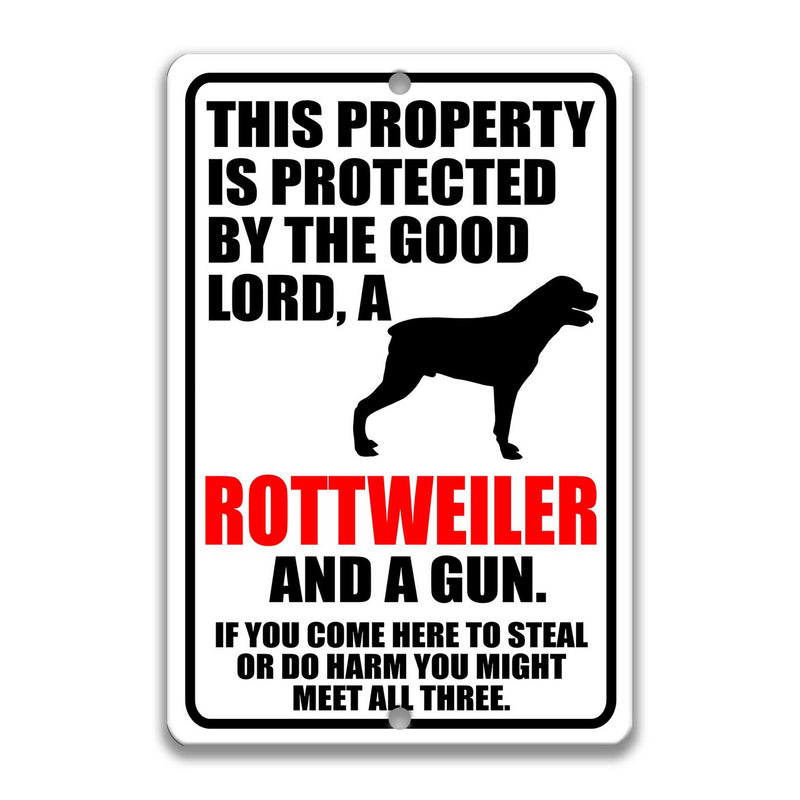 Lord, Rottweiler and a Gun Sign