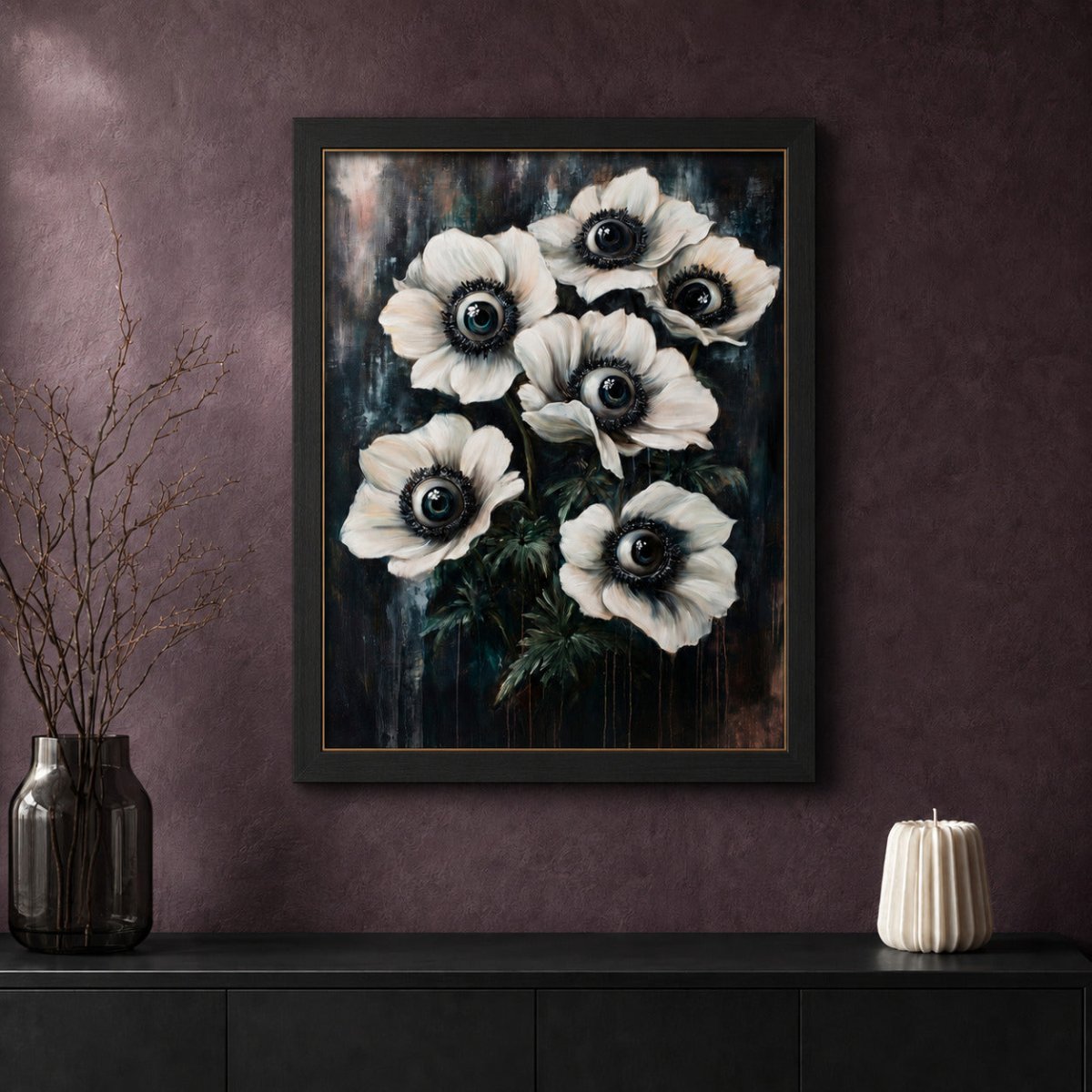 Framed gothic botanical print featuring six white flowers with eye centers displayed on a deep plum wall.