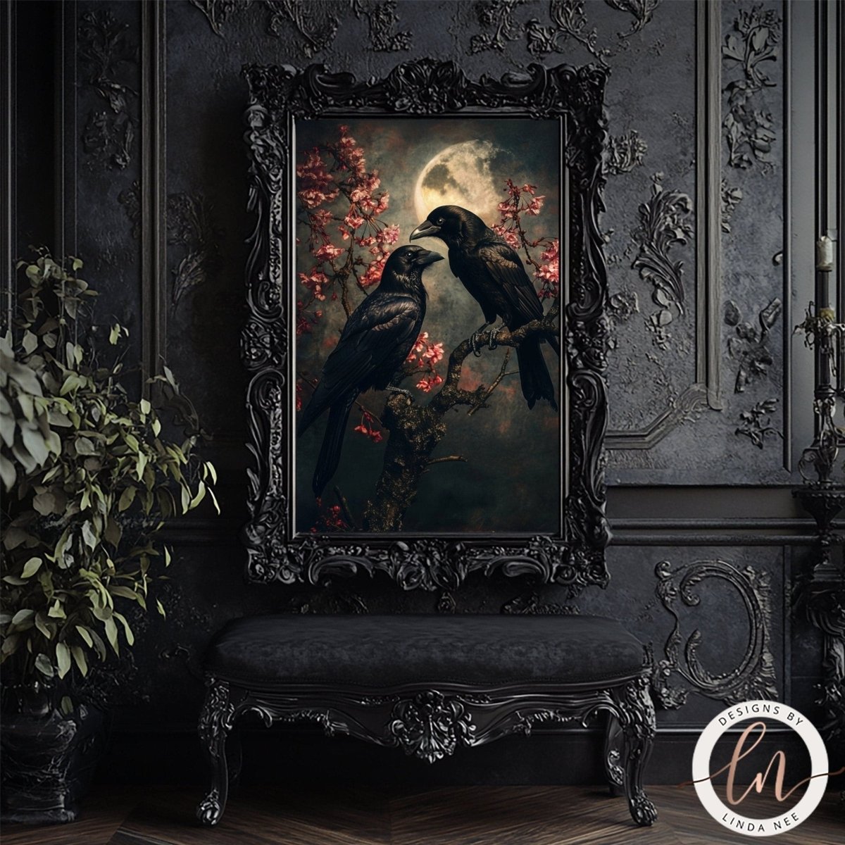 Two ravens under a full moon print displayed on a black bench with a candle