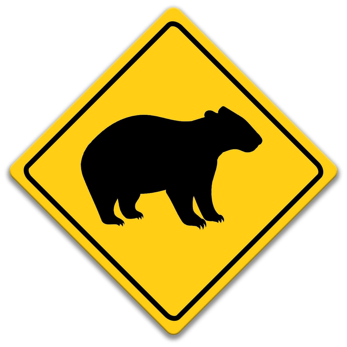 a yellow diamond-shaped sign with a black silhouette of a wombat in the center.