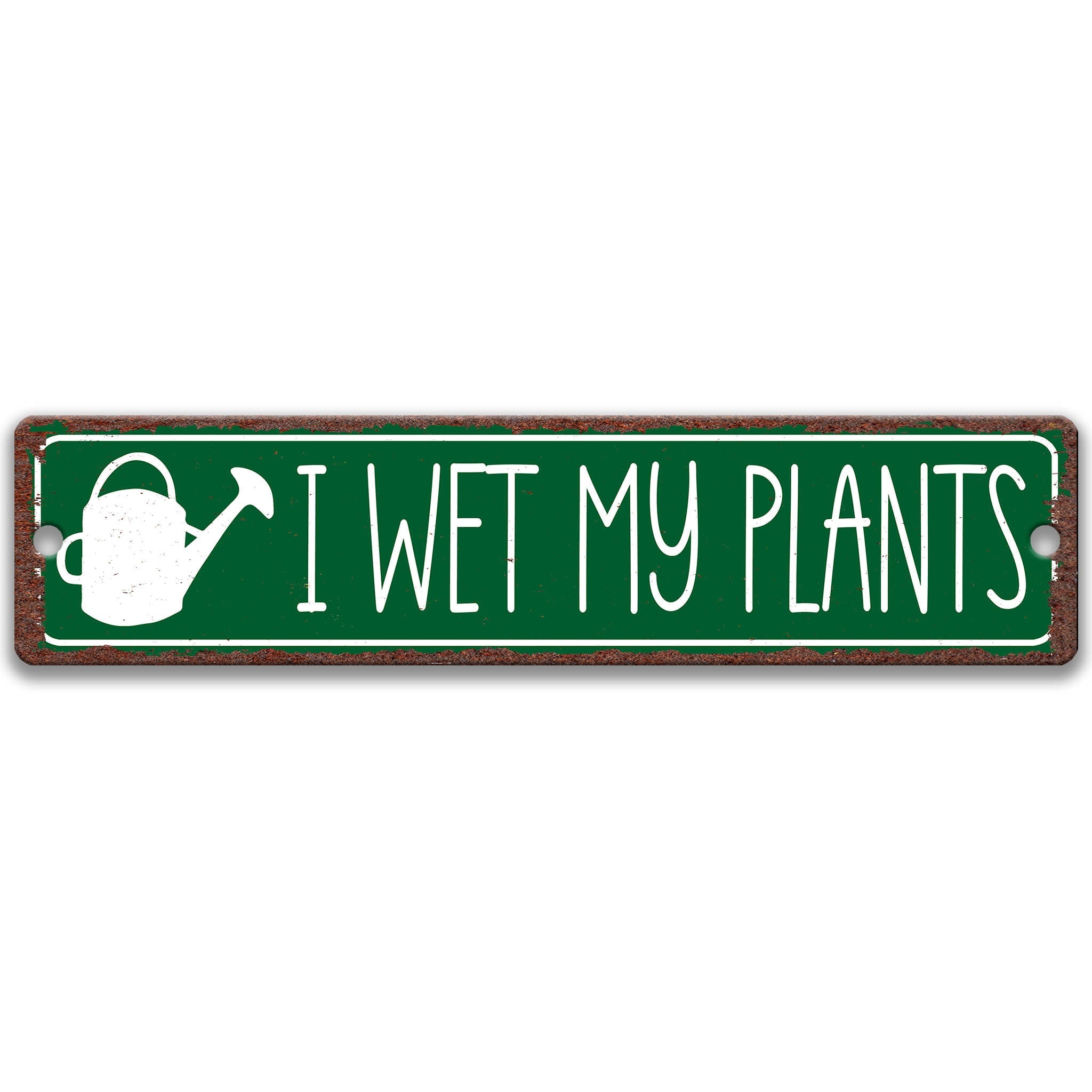 a green sign with the text "I WET MY PLANTS" written on it.