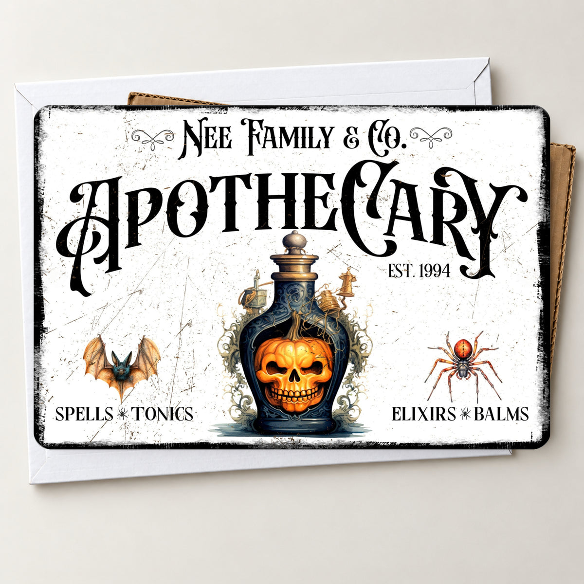 A rectangular vintage-style Halloween greeting card or sign with distressed white background and black gothic text reading 'Nee Family & Co. Apothecary Est.