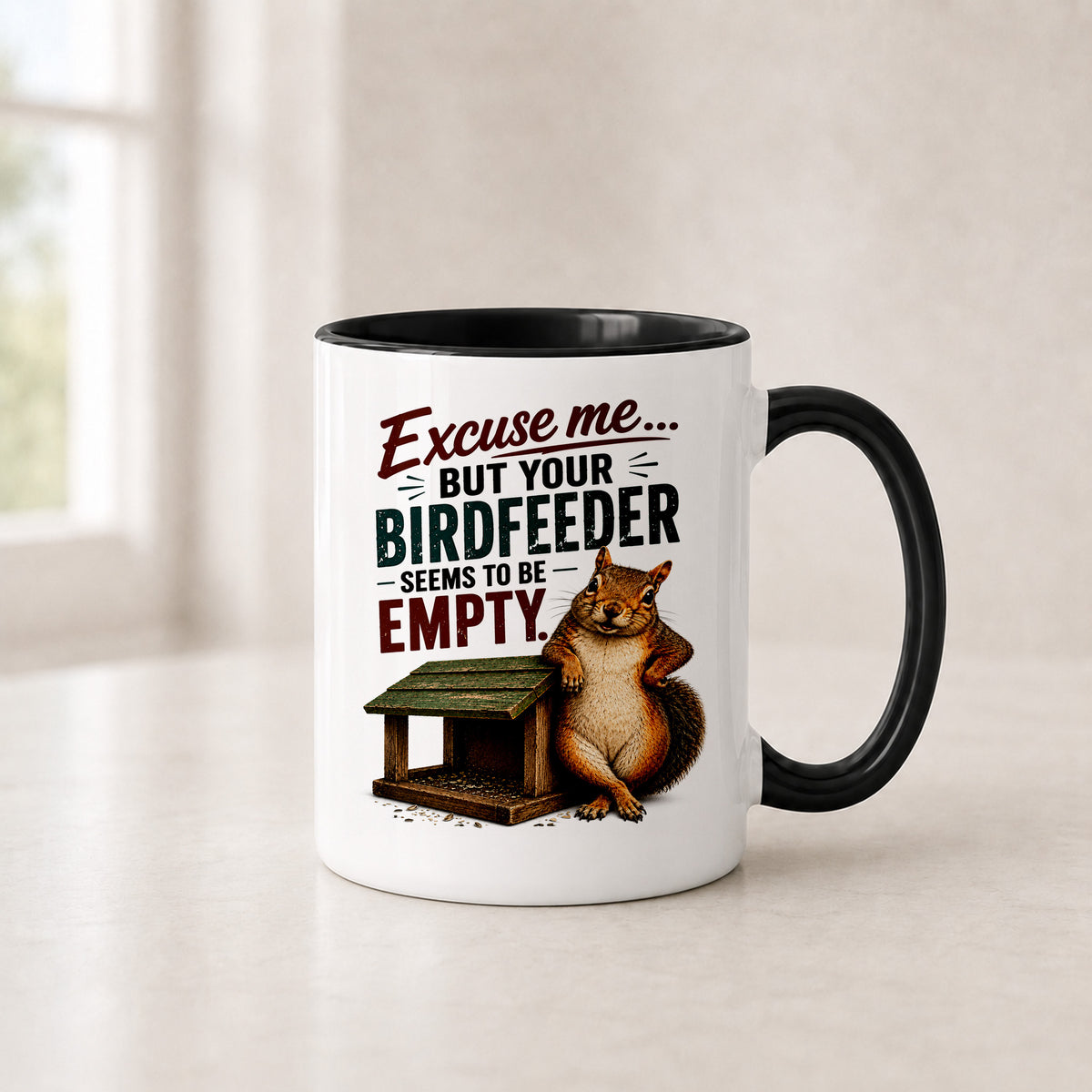 Your Birdfeeder Seems to Be Empty squirrel mug in the 11 oz black handle version with a black interior