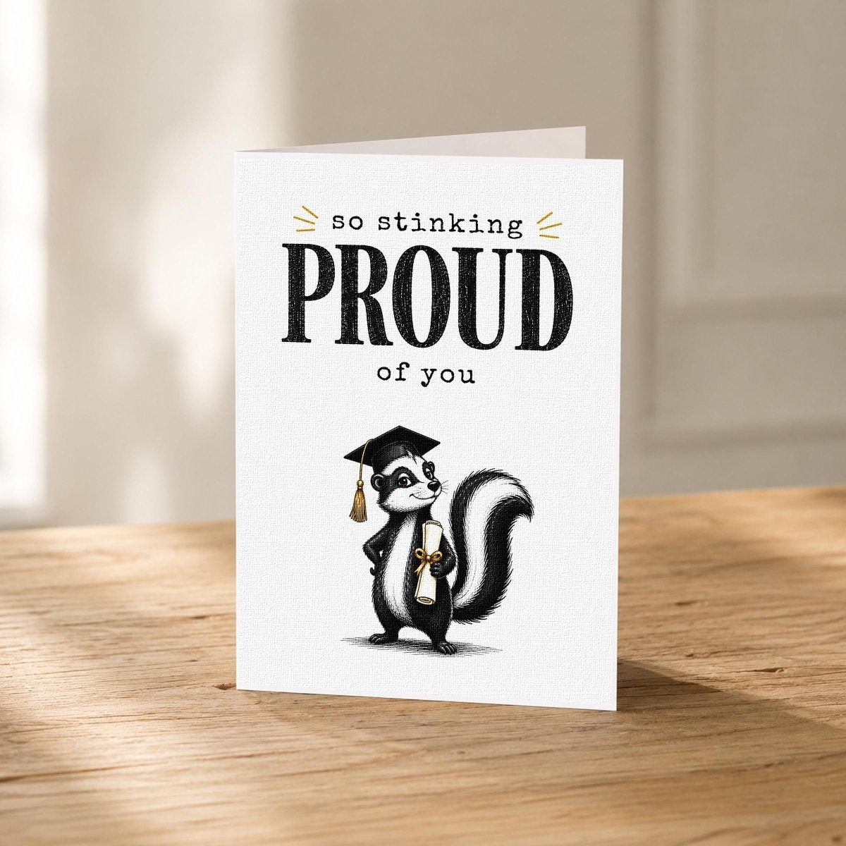 So Stinking Proud Skunk Graduation Card flat lay showing the full vintage-style typography design.