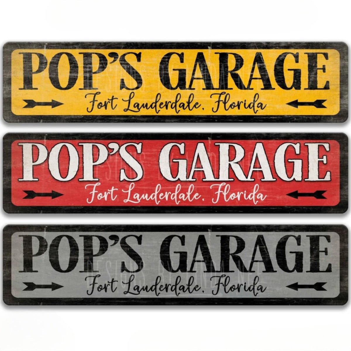 three rectangular signs with the text "POP'S GARAGE" written on them. The signs are made of a material that appears to be aluminum and are protected by a UV-resistant coating.