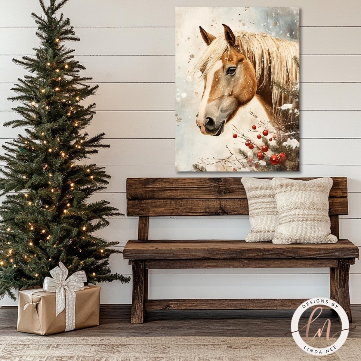 a wooden bench with two pillows, a Christmas tree with lights, and a large painting of a horse's head on the wall above the bench.