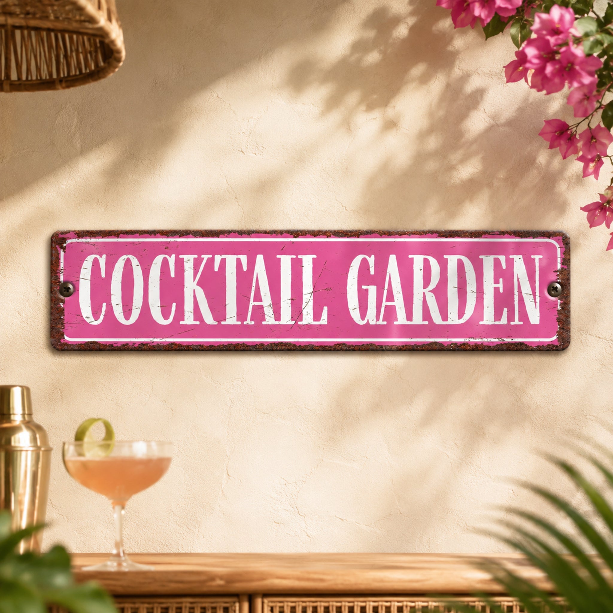 a pink sign that reads "Cocktail Garden" hanging on a wall, with a glass of pink cocktail and a plant in the foreground.
