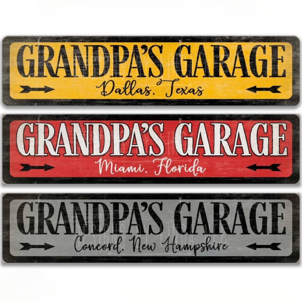 three rectangular signs with the text "Grandpa's Garage" written on them. The signs are in different colors and sizes, and they appear to be made of metal or wood.