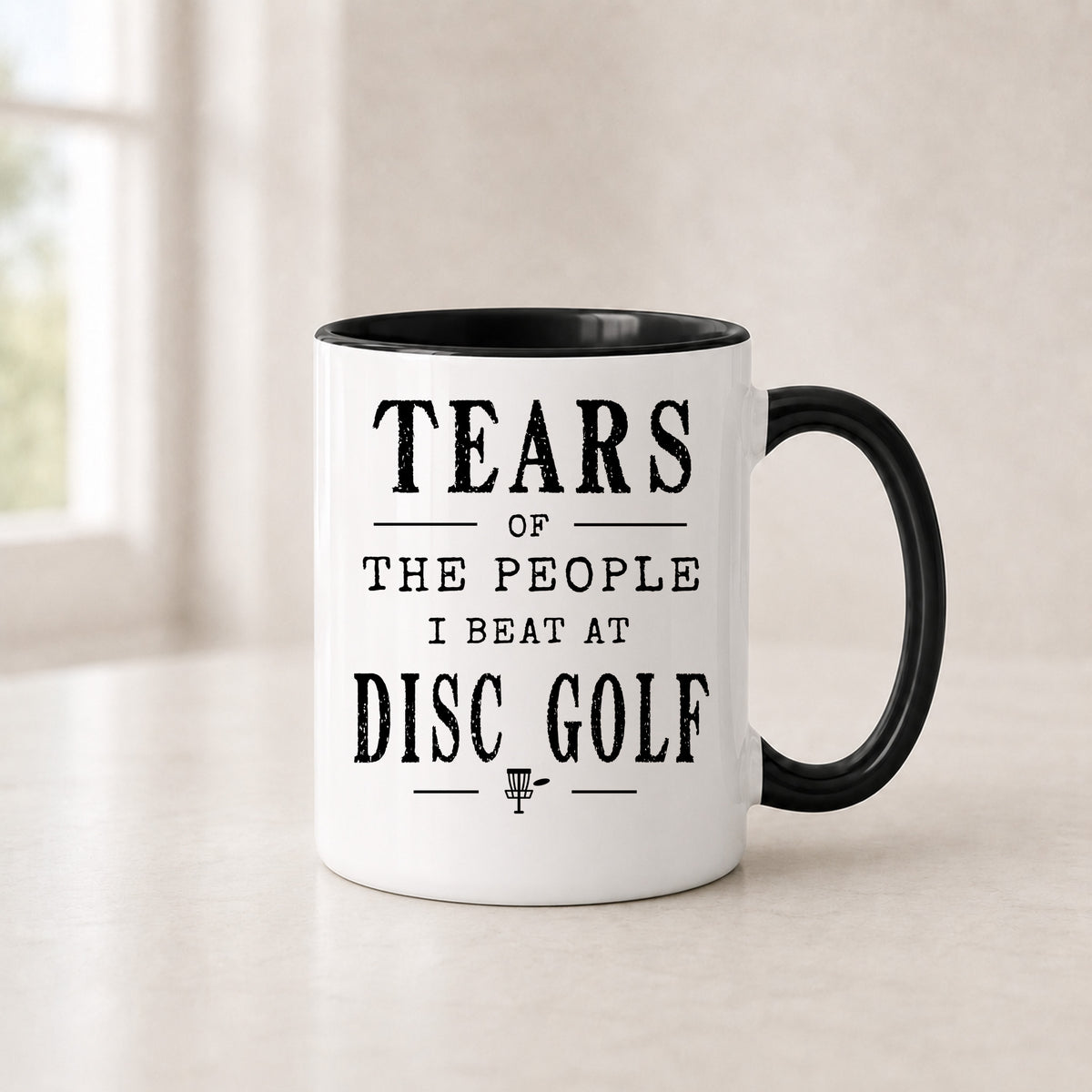 Tears of the People I Beat at Disc Golf mug in the 11 oz black handle version with a black interior