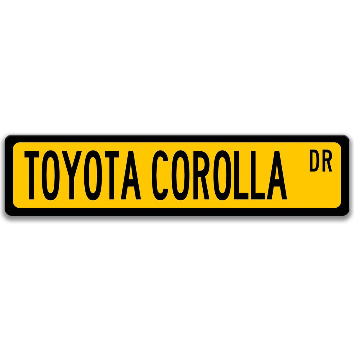 Yellow Toyota Corolla street sign with black border and black text reading TOYOTA COROLLA DR
