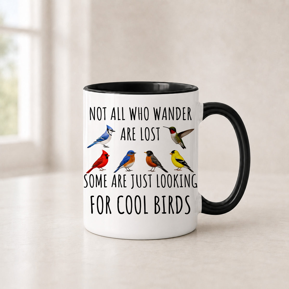 Cool birds mug in the 11 oz black handle version with a black interior, showing six painted songbirds