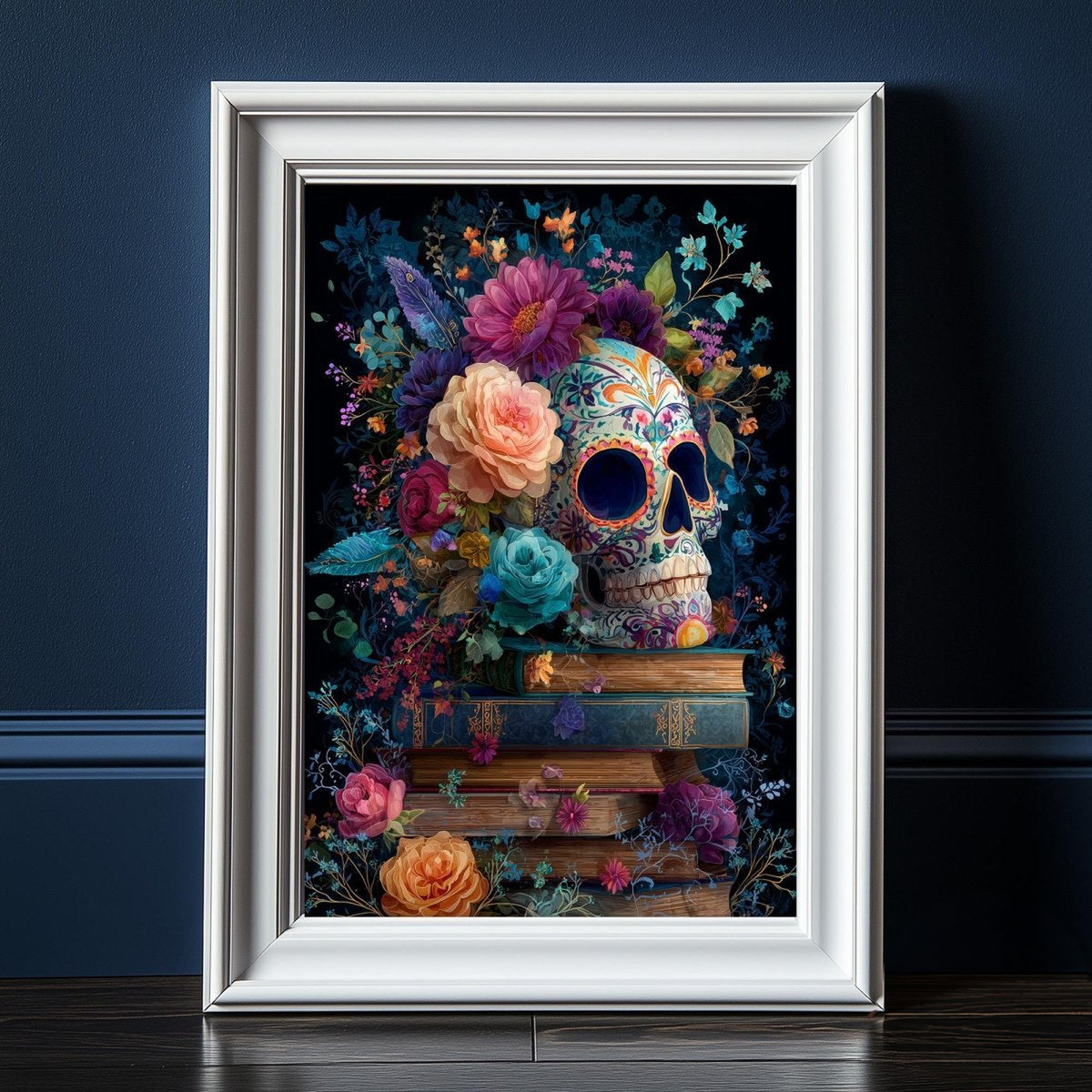 A framed artwork depicting a colorful skull surrounded by a vibrant floral arrangement, with books below it, set against a dark blue background.