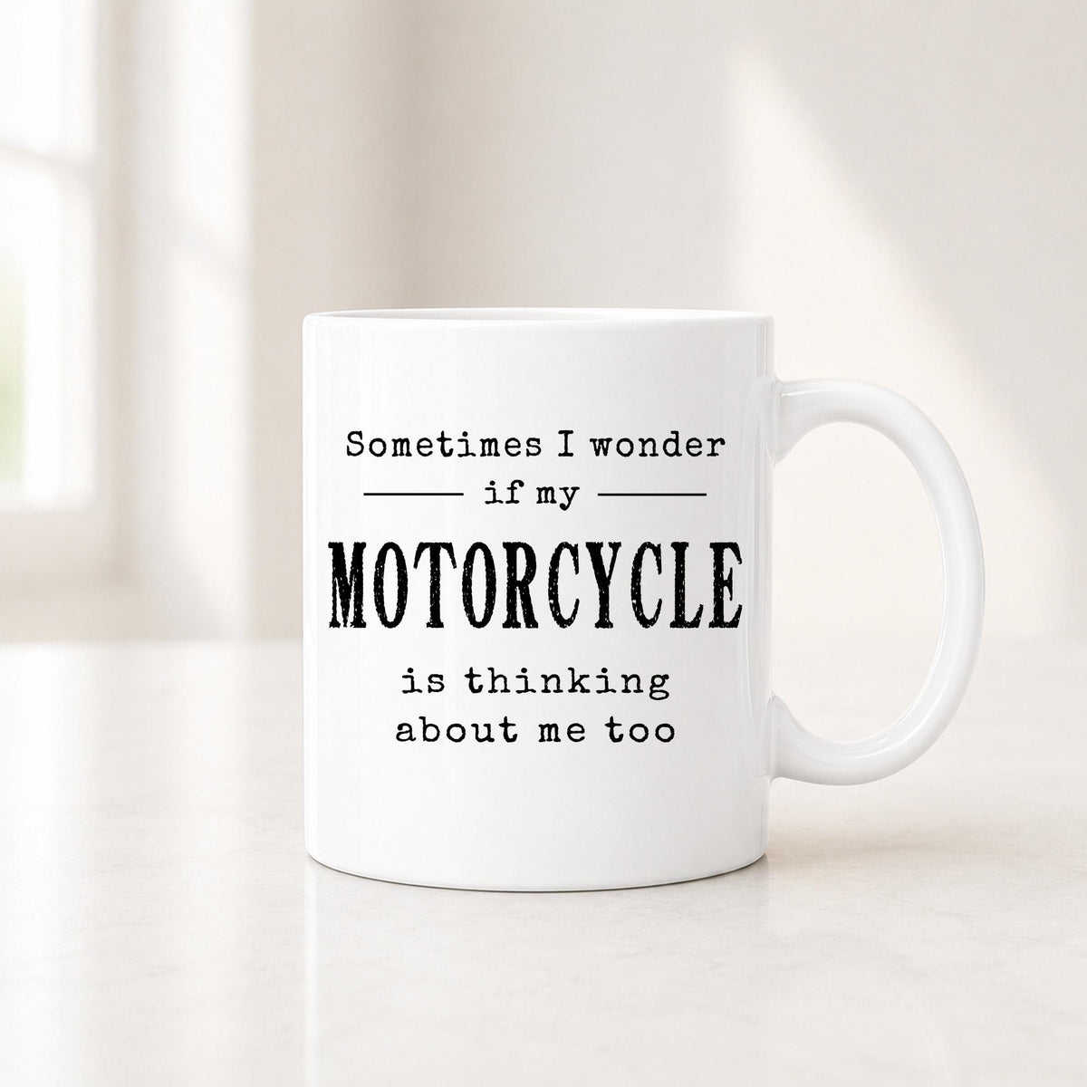 Second view of the white motorcycle mug showing the black quote about wondering if my motorcycle is thinking about me