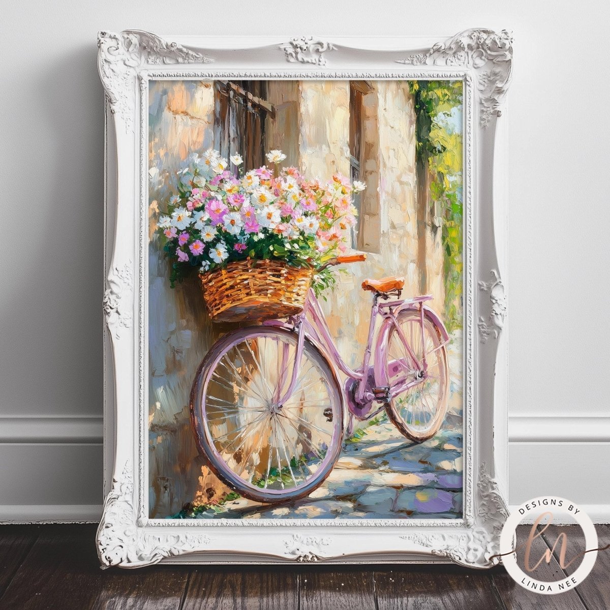 A framed painting depicting a pink bicycle with a basket filled with colorful flowers, set against a backdrop of a stone wall and a tree.