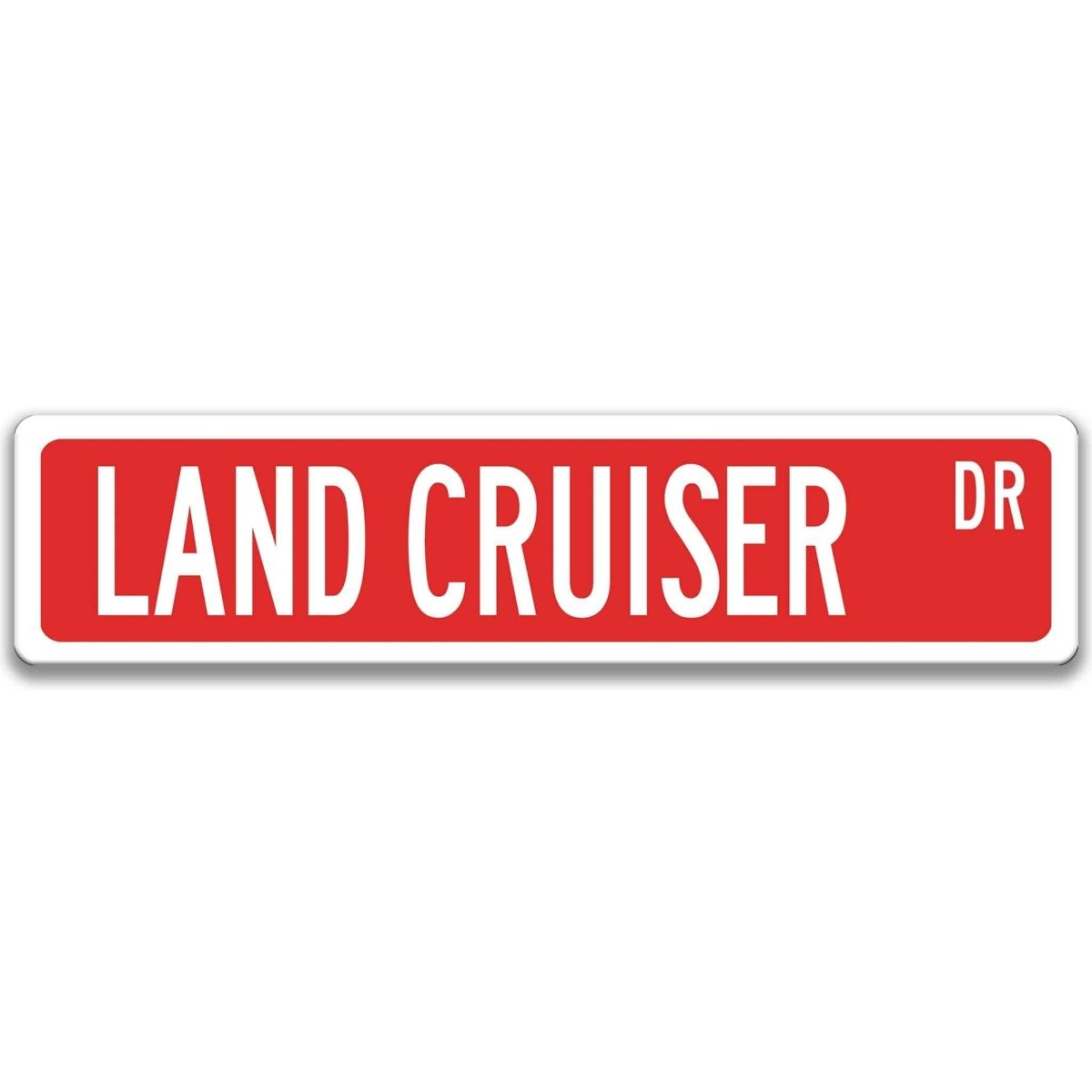 Red street sign with white border, white text reading LAND CRUISER DR