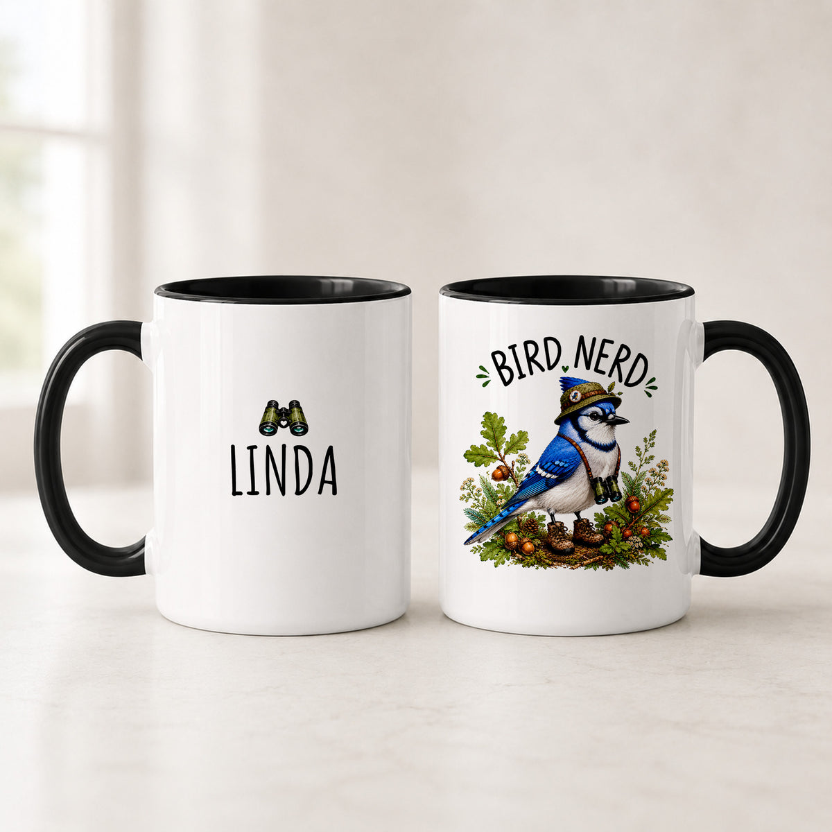 Black handle Blue Jay Bird Nerd mugs showing the name LINDA under binoculars and the blue jay in a safari hat
