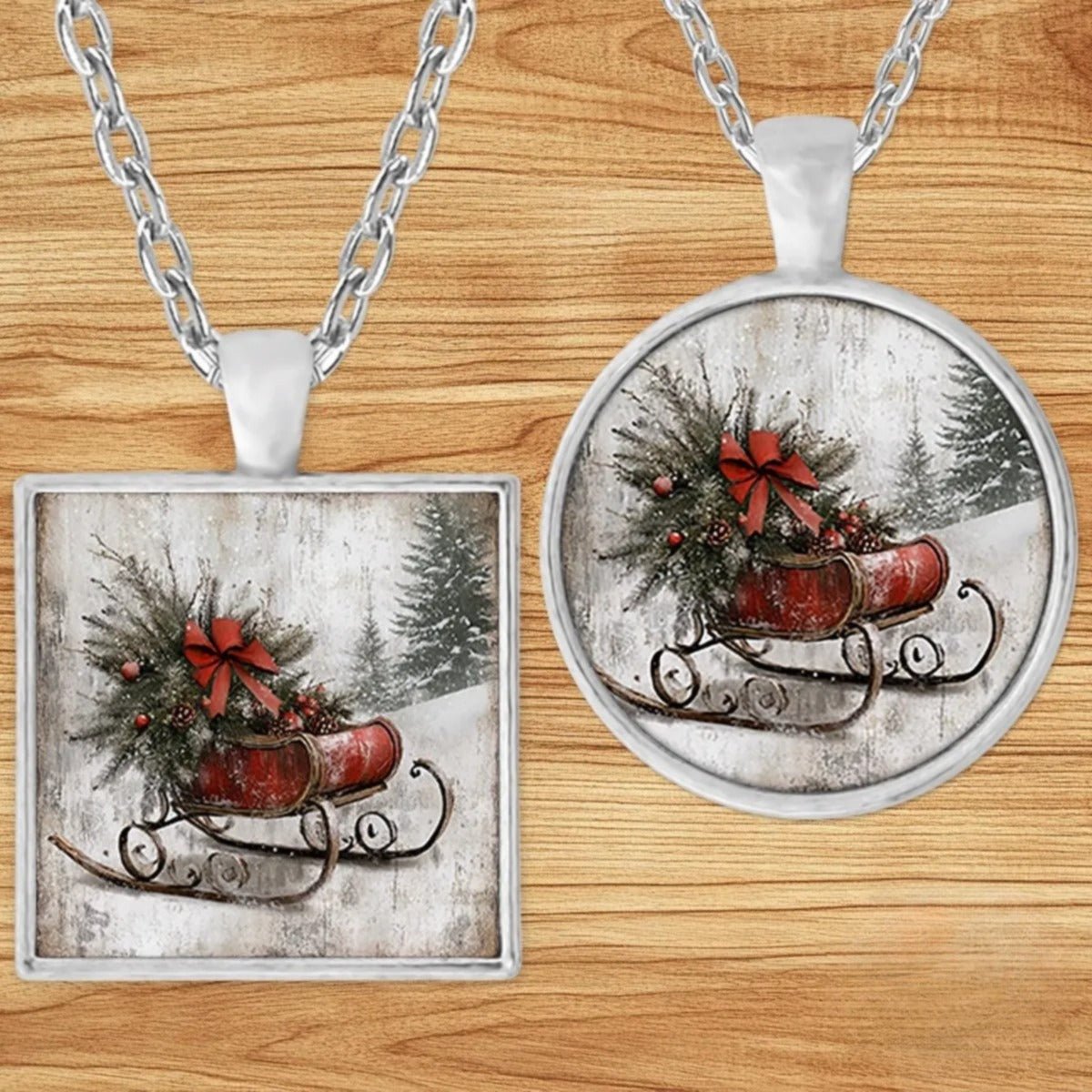 Vintage Red Sled Christmas pendant necklace shown in round and square silver charm styles on a wood background