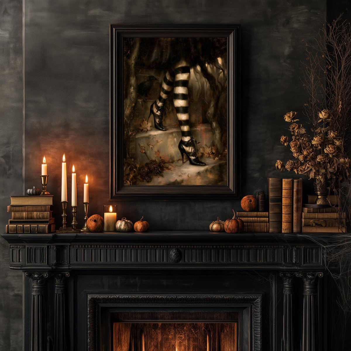 Striped stockings wall art above a mantel with lit candles and stacked books